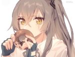  1girl black_gloves commentary_request doughnut fingerless_gloves food girls_frontline gloves grey_hair hair_between_eyes holding long_hair looking_at_viewer moa_(21energy12) scar scar_across_eye simple_background solo ump45_(girls_frontline) white_background yellow_eyes 