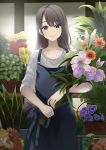  1girl apron bangs black_apron black_hair blue_eyes florist flower highres holding holding_flower john_manjirou_(love-love-happy21) long_hair looking_at_viewer original pansy parted_bangs shirt solo standing tulip white_shirt 