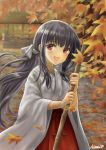  1girl :d absurdres artist_name autumn_leaves black_hair blurry blurry_background blush broom brown_eyes day hakama highres hinari080812 japanese_clothes leaf long_hair maple_leaf miko open_mouth outdoors red_hakama sidelocks smile wide_sleeves 