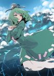  1girl absurdres black_headwear blue_sky breast_hold breasts clouds commentary_request day dress ghost_tail green_dress green_eyes green_hair hand_up hat highres juliet_sleeves kawayabug lightning long_sleeves medium_breasts ofuda outdoors parted_lips puffy_sleeves short_hair sky soga_no_tojiko solo tate_eboshi touhou 