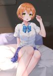  1girl absurdres arm_support arm_up dishiren highres hoshizora_rin looking_at_viewer love_live! love_live!_school_idol_project neck_ribbon on_bed open_mouth orange_hair ribbon school_uniform serafuku short_hair solo thighs yellow_eyes 