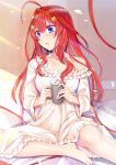  1girl absurdres ahoge barefoot blue_eyes breasts coffee coffee_mug commentary_request cup fingernails go-toubun_no_hanayome gu_li hair_ornament highres holding holding_cup large_breasts long_hair mug nail_polish nakano_itsuki nightgown open_mouth pillow pink_nails redhead sitting solo star star_hair_ornament symbol_commentary 