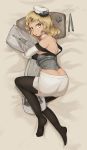  1girl bed black_legwear blonde_hair breasts commentary dakimakura_(object) english_commentary full_body hat headgear highres houston_(kantai_collection) jakkit01828 kantai_collection large_breasts long_hair looking_at_viewer peaked_cap pillow pillow_hug rocket short_hair skirt solo thigh-highs white_headwear white_skirt yellow_eyes 