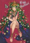  1girl absurdres barefoot braid christmas_lights christmas_ornaments closed_mouth dress fire_emblem fire_emblem:_three_houses green_eyes green_hair hair_ornament highres kirr_rr long_hair merry_christmas pointy_ears red_background simple_background solo sothis_(fire_emblem) tiara twin_braids 