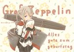  1girl absurdres black_legwear black_skirt blonde_hair capelet celtic_knot character_name commentary_request flight_deck german_text graf_zeppelin_(kantai_collection) grey_eyes hair_between_eyes happy_birthday hat highres iron_cross jacket kantai_collection long_hair looking_at_viewer machinery military military_hat military_uniform miniskirt pantyhose peaked_cap pleated_skirt pot-de sidelocks skirt solo standing tsurime twintails twitter_username uniform 