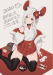  1girl animal_ears black_legwear bowl chinese_zodiac flower food hair_flower hair_ornament highres japanese_clothes kaoruko(unkrk55) miko mochi mouse mouse_ears nengajou new_year original red_eyse sitting thigh-highs white_hair year_of_the_rat zettai_ryouiki 