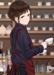  1girl apron bangs barista black_shirt brown_eyes brown_hair closed_mouth coffee_maker_(object) commentary_request cup earrings from_side highres holding holding_cup holding_saucer indoors jewelry looking_at_viewer looking_to_the_side original red_apron saitou_(lynx-shrike) shirt short_hair smile solo teacup teapot upper_body 