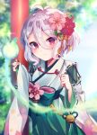  1girl antenna_hair bangs bell beniko_(ymdbnk) blurry blurry_background blush bow closed_mouth commentary_request day depth_of_field eyebrows_visible_through_hair flower green_bow green_hakama hair_between_eyes hair_flower hair_ornament hakama highres japanese_clothes jingle_bell kimono kokkoro_(princess_connect!) long_sleeves outdoors pinching_sleeves pink_flower pointy_ears princess_connect! princess_connect!_re:dive red_eyes red_flower silver_hair sleeves_past_wrists smile solo white_flower white_kimono wide_sleeves 