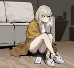  1girl animal_slippers bangs blanket blonde_hair bunny_slippers camisole commentary couch crossed_legs cup gogalking highres holding holding_cup looking_at_viewer mug original panties phone short_shorts shorts sitting slippers solo steam underwear white_panties wooden_floor 