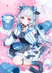  1girl animal_ears animal_print apron arm_up bell black_boots black_dress black_ribbon blue_apron blue_bow blue_socks boots bow bucket commentary_request cow_ears cow_print cow_tail cropped_jacket dress frilled_apron frilled_skirt frills hair_bow highres jacket knee_strap long_hair long_sleeves looking_at_viewer milk open_clothes open_jacket open_mouth original pink_eyes ribbon sitting skirt socks solo tail watermark white_hair white_jacket yutukicom 