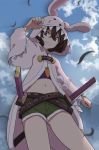  1girl adjusting_hood animal_hood belt black_hair bunny_hood carrot_necklace clouds cloudy_sky cowboy_shot crop_top cutoffs from_below fur-trimmed_jacket fur_trim green_shorts grin highres hood hooded_jacket inaba_tewi jacket long_sleeves looking_at_viewer looking_down midriff multiple_belts navel nurupo_(abooon) open_clothes open_jacket pink_jacket red_eyes shorts sky slit_pupils smile solo standing sword touhou weapon 