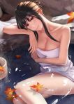  1girl absurdres arm_support autumn_leaves backlighting bangs blurry breasts brown_hair bucket collarbone depth_of_field fingernails hands_up head_rest head_tilt highres large_breasts leaf leaning light_particles lips long_hair looking_at_viewer maple_leaf mole mole_under_eye onsen orange_eyes original partially_submerged rock shiny shiny_skin sidelocks sitting smile solo towel water wet wooden_bucket 