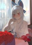  1girl alternate_costume blush bouquet bow cup flower girls_frontline hair_bow highres holding holding_cup jewelry juz long_hair long_sleeves necklace pov pov_hands red_eyes silver_hair solo_focus sweat sweater tokarev_(girls_frontline) turtleneck turtleneck_sweater upper_body valentine window 