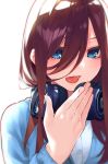  1girl :d bangs blue_cardigan blue_eyes breasts brown_hair buttons cardigan eyebrows_behind_hair go-toubun_no_hanayome hair_between_eyes hand_up haruba_negi headphones headphones_around_neck highres large_breasts long_hair long_sleeves looking_at_viewer nakano_miku official_art open_mouth shirt sidelocks simple_background smile solo tongue upper_body white_background white_shirt 