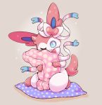  between_legs blue_eyes brown_background commentary creature english_commentary flufflixx full_body gen_6_pokemon highres no_humans one_eye_closed pillow pokemon pokemon_(creature) simple_background solo sparkle sylveon 