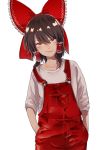  1girl absurdres black_hair bow commentary_request hair_bow hair_tubes hakurei_reimu hands_in_pockets highres himari-san_yanaika looking_at_viewer overalls raised_eyebrow red_eyes red_overalls shirt simple_background smirk solo touhou white_background white_shirt 
