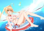  1girl ahoge bangs bare_shoulders bikini blonde_hair breasts commentary_request criss-cross_halter eyebrows_visible_through_hair fang fate/grand_order fate_(series) green_eyes hair_intakes halterneck highres innertube large_breasts long_hair looking_at_viewer navel nero_claudius_(fate)_(all) nero_claudius_(swimsuit_caster)_(fate) side-tie_bikini solo striped striped_bikini swimsuit tming twintails water 