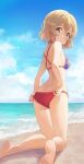  1girl adjusting_clothes adjusting_swimsuit beach bikini blonde_hair blue_eyes blue_sky blush breasts day from_behind highres hiroki_(yyqw7151) kanojo_okarishimasu kneeling looking_back nanami_mami ocean open_mouth outdoors red_bikini sand short_hair sky solo star_(symbol) star_print swimsuit water 