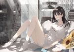  1girl bare_legs black_hair blue_eyes bookshelf commentary_request flower from_side jewelry kodamazon lamp long_hair looking_at_viewer lying necklace on_back original shirt short_sleeves solo sunflower white_shirt 