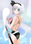 1girl absurdres ass bangs bare_thighs blunt_bangs blurry blush bob_cut box commentary_request competition_swimsuit cowboy_shot depth_of_field from_behind ghost green_eyes heart highres hitodama jack_(wkm74959) konpaku_youmu konpaku_youmu_(ghost) legs legs_together looking_at_viewer one-piece_swimsuit short_hair silver_hair solo standing swimsuit sword thighs touhou two-tone_swimsuit weapon