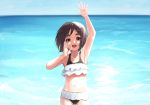  1girl alternate_costume bangs beach bikini black_hair blue_sky brown_eyes clouds cowboy_shot day frilled_bikini frills horizon kantai_collection kibitarou looking_at_viewer maru-yu_(kantai_collection) ocean outdoors parted_bangs short_hair sky solo standing swimsuit thick_eyebrows two-tone_bikini 