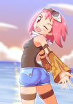  1girl ;d aero ass blush breasts clouds cougar1404 cowboy_shot detached_sleeves dusk goggles goggles_on_head looking_at_viewer looking_back medium_hair ocean one_eye_closed open_mouth pink_hair red_eyes rockman rockman_dash rockman_dash_3 scarf short_shorts shorts small_breasts smile solo sunset 