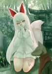  1girl absurdres animal_ear_fluff animal_ears bangs bow commentary_request eyebrows_visible_through_hair forest fox_ears fox_tail full_body fur-trimmed_sleeves fur_trim hands_together head_tilt highres jacket kemono_friends kneeling komeiponkiti long_hair long_sleeves looking_at_viewer nature oinari-sama_(kemono_friends) outdoors pleated_skirt shrine skirt solo statue tail thigh_strap torii very_long_hair white_bow white_hair white_jacket white_skirt yellow_eyes 