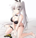  1girl animal_ears bed bikini black_bikini black_swimsuit bow breasts earrings five-seven_(girls_frontline) girls_frontline gun hair_bow handgun highres jewelry keenh large_breasts long_hair on_bed orange_eyes pistol rabbit_ears silver_hair sitting sitting_on_bed solo sulking swimsuit weapon white_background 