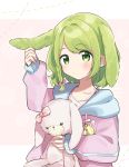  1girl animal_ears bangs blush bow braid green_eyes green_hair hair_bow highres holding holding_stuffed_animal kemonomimi_mode long_sleeves medium_hair morinaka_kazaki nijisanji pink_bow pink_hoodie rabbit_ears sleeves_past_wrists solo stuffed_animal stuffed_bunny stuffed_toy virtual_youtuber yuama_(drop) 