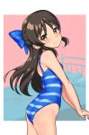  1girl ass bed blue_bow blue_swimsuit bow brown_eyes brown_hair casual_one-piece_swimsuit commentary_request cowboy_shot from_behind hair_bow idolmaster idolmaster_cinderella_girls long_hair looking_at_viewer one-piece_swimsuit riking solo standing striped striped_swimsuit swimsuit tachibana_arisu 