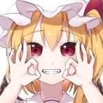  1girl bangs blonde_hair blurry blurry_background commentary_request depth_of_field double_ok_sign eringi_(rmrafrn) eyebrows_visible_through_hair fangs flandre_scarlet grin hair_between_eyes hands_up hat long_hair looking_at_viewer mob_cap ok_sign one_side_up portrait red_eyes simple_background smile solo touhou white_background white_headwear wings 