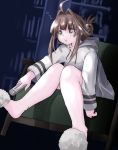  1girl ahoge alternate_costume alternate_hairstyle brown_eyes brown_hair chicken99 controller couch double_bun dress grey_dress highres hood hooded_dress hoodie kantai_collection kongou_(kantai_collection) long_hair remote_control sitting slippers solo sweater sweater_dress 