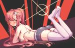  1girl artist_name ass bare_shoulders bikini_top black_shorts blush breasts commentary eyebrows_visible_through_hair hair_ornament kaptivate large_breasts long_hair looking_at_viewer lying no_shoes on_stomach open_mouth ponytail redhead short_shorts shorts skull_hair_ornament solo tengen_toppa_gurren_lagann thigh-highs very_long_hair white_legwear yellow_eyes yoko_littner 