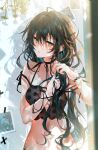 1girl adjusting_hair arutera bangs banned_artist black_camisole black_hair blue_nails camisole commentary_request green_eyes hair_between_eyes highres long_hair navel original parted_lips shadow solo sunlight upper_body very_long_hair wavy_hair 