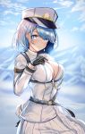  1girl absurdres azur_lane black_gloves blue_eyes blue_hair blue_sky blush breasts chain chapayev_(azur_lane) closed_mouth clouds eyebrows_visible_through_hair gloves hair_ornament hairclip hat highres jacket kulayueyue large_breasts looking_at_viewer military_hat mole mole_on_breast mountain peaked_cap short_hair sky smile snow solo white_headwear white_jacket 