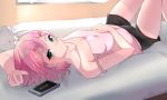  1girl absurdres arm_behind_head breasts cellphone chiyoda_momo collarbone expressionless green_eyes hair_ornament hairclip hand_on_own_stomach highres looking_at_viewer looking_to_the_side lying machikado_mazoku on_back phone pillow_(blackpirou) pink_hair short_hair short_shorts shorts small_breasts smartphone solo strap_slip tank_top thighs 