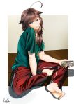  1girl absurdres ahoge alternate_costume barefoot blue_eyes brown_hair casual cellphone eyebrows_visible_through_hair green_shirt hair_flaps hair_over_shoulder highres holding holding_phone kantai_collection long_hair looking_at_viewer pants phone red_pants remodel_(kantai_collection) shigure_(kantai_collection) shirt short_sleeves signature sitting smartphone smile solo track_pants tsui_(kojiya) 