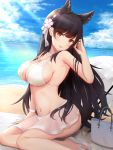  1girl animal_ears atago_(azur_lane) atago_(midsummer_march)_(azur_lane) azur_lane bag bangs beach bikini blue_sky breasts brown_eyes choker clouds day extra_ears eyebrows_visible_through_hair fox_ears hair_ornament hand_up highres kirifrog large_breasts long_hair looking_at_viewer mole mole_under_eye ocean outdoors parasol sand sitting sky smile solo swimsuit umbrella 