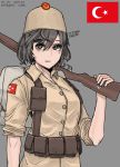  1girl backpack bag breasts brown_eyes brown_hair brown_headwear eyebrows_visible_through_hair flag grey_background gun highres holding holding_gun holding_weapon kaiserreich looking_at_viewer medium_breasts messy_hair military mole mole_under_eye original parted_lips pixiv_username pzkpfwi rifle short_hair short_sleeves simple_background sleeves_rolled_up solo weapon 