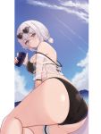  1girl ass azur_lane bangs beach bikini black_bikini blush breasts cellphone closed_mouth clouds day eyebrows_visible_through_hair eyewear_on_head hair_between_eyes heart heart-shaped_eyewear highres large_breasts looking_at_viewer ocean outdoors phone red_eyes short_hair sirius_(azur_lane) sirius_(midsummer_seirios)_(azur_lane) sitting sky smartphone solo sunglasses swimsuit water white_hair yukidaifuku 