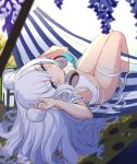  +_+ 1girl azur_lane bangs blue_eyes book commentary_request day double_bun eyes_visible_through_hair flower hammock headphones highres holding holding_book le_malin_(azur_lane) long_hair looking_at_viewer lying narrowed_eyes nemeneko_6 on_back outdoors silver_hair slingshot_swimsuit solo sunflower swimsuit upside-down very_long_hair white_swimsuit 