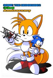  1boy animal_ears anniversary artist_name black_eyes body_fur character_doll closed_mouth commentary_request dated doll fox_boy fox_ears fox_tail full_body furry furry_male gloves hand_up highres holding holding_doll holding_toy judy_totoya looking_at_object male_focus multiple_tails official_artist_extra red_shoes shoes simple_background smile solo sonic_(series) sonic_the_hedgehog sonic_the_hedgehog_(classic) sonic_the_hedgehog_2 standing tail tails_(sonic) tornado_(airplane)_(sonic) toy toy_airplane two_tails white_background white_gloves yellow_fur 