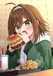  1girl :o ahoge blurry blurry_background blush brick_wall brown_hair burger burger_king commentary_request cup depth_of_field disposable_cup drinking_straw fang food french_fries green_eyes green_jacket hair_between_eyes hair_intakes hairband hands_up haru_(kuzuyu) highres holding holding_food hood hood_down hoodie indoors jacket komori_kuzuyu long_sleeves looking_at_viewer open_mouth puffy_long_sleeves puffy_sleeves solo upper_body white_hairband white_hoodie 
