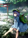  1girl backpack bag barefoot blue_dress blue_eyes blue_hair day dress green_headwear hair_between_eyes hair_bobbles hair_ornament hat highres kawashiro_nitori key on_rock open_mouth outdoors pliers reflection rock ryosios sitting sitting_on_rock solo tools torii touhou tree v_arms water wrench 