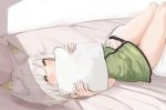  1girl animal_ear_fluff animal_ears arknights bangs bare_arms bare_shoulders bed blush dress green_dress green_eyes highres holding holding_pillow kal&#039;tsit_(arknights) kashiyarrm looking_at_viewer lying on_back ore_lesion_(arknights) pillow short_dress short_hair silver_hair solo thighs watch watch white_background 