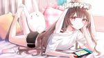  1girl :o animal_ears bare_shoulders barefoot bed_sheet black_shorts blush brown_eyes brown_hair bunny_girl bunny_tail cellphone collarbone day flower flower_wreath frilled_pillow frills full_body head_wreath highres holding indoors iren_lovel legs_up long_hair looking_at_viewer lying nintendo_switch off_shoulder on_stomach original parted_lips phone pillow plaid rabbit_ears revision shirt short_shorts short_sleeves shorts soles solo stuffed_animal stuffed_bunny stuffed_toy sunlight tail very_long_hair white_flower white_shirt window 