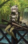  1girl absurdres antlers arknights arrow_(projectile) black_footwear black_gloves black_skirt bow_(weapon) breasts commentary_request covered_mouth crossbow day firewatch_(arknights) forest full_body gloves green_jacket green_legwear grey_hair hands_up highres holding jacket long_sleeves nature ndtwofives on_railing open_clothes open_jacket outdoors pantyhose pleated_skirt ponytail reindeer_antlers river shirt shoes sitting sitting_on_railing skirt small_breasts sniper_scope solo twitter_username water waterfall weapon white_shirt 