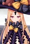  1girl abigail_williams_(fate/grand_order) absurdres arms_behind_back bangs bare_shoulders black_bow black_headwear blonde_hair blush bow breasts closed_mouth fate/grand_order fate_(series) forehead frosver hat highres keyhole long_hair multiple_bows navel orange_bow parted_bangs pink_eyes small_breasts stuffed_animal stuffed_toy teddy_bear white_skin witch_hat 