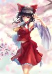  1girl absurdres armpits asllapistone black_hair bow cherry_blossoms day floating_hair hair_bow hair_tubes hakurei_reimu highres layered_skirt long_hair long_sleeves midriff miniskirt outdoors red_bow red_legwear red_ribbon red_shirt red_skirt red_sleeves ribbon ribbon-trimmed_sleeves ribbon_trim sarashi shiny shiny_hair shirt skirt sleeveless sleeveless_shirt solo standing standing_on_one_leg stomach tabi touhou twintails wide_sleeves 