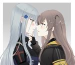  2girls armband bangs black_gloves black_jacket blunt_bangs blush border breasts brown_eyes brown_hair clenched_teeth clothes_writing commentary_request eye_contact eyebrows_visible_through_hair fingerless_gloves from_side girls_frontline gloves green_eyes grey_background hair_ornament hand_on_another&#039;s_chin highres hk416_(girls_frontline) jacket long_hair long_sleeves looking_at_another medium_breasts multiple_girls one_side_up outside_border parted_lips profile scar scar_across_eye sidelocks silver_hair simple_background smile sui_(camellia) teeth ump45_(girls_frontline) white_border yuri 